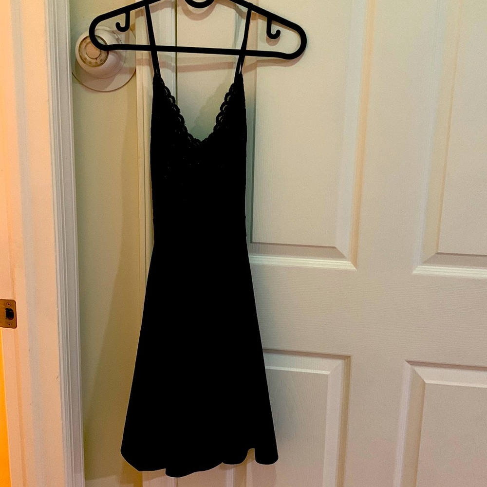 Black short dress. It’s completely new. Brand is Leyva’s USA size M.